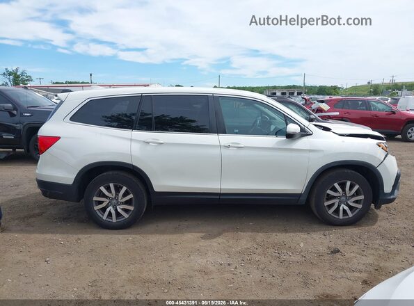 5FNYF6H33KB062757 2019 HONDA PILOT Белый Вид задней части салона