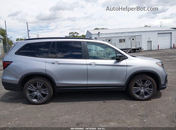 5FNYF6H34NB067017 2022 HONDA PILOT Silver Սալոնի հետևի տեսք