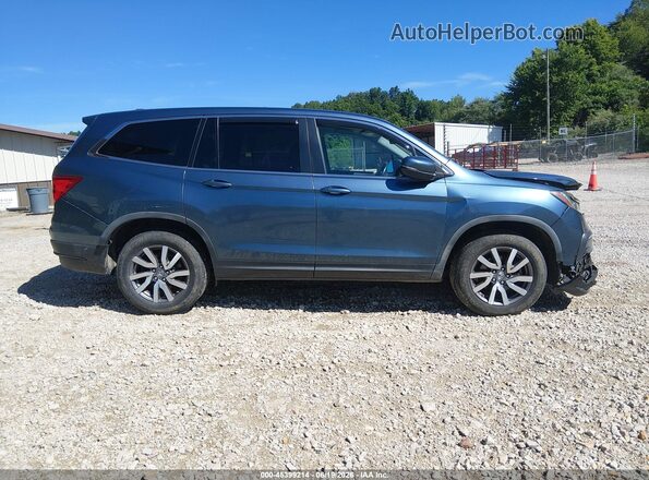 5FNYF6H35KB046866 2019 HONDA PILOT Blue Vista interior trasera