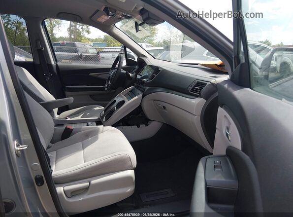 5FNYF6H38KB098878 2019 HONDA PILOT Gray Front interior view