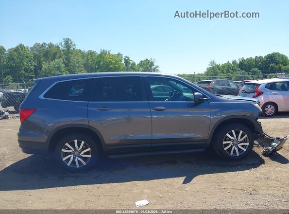 5FNYF6H39MB014618 2021 HONDA PILOT Gray Widok wnętrza z tyłu