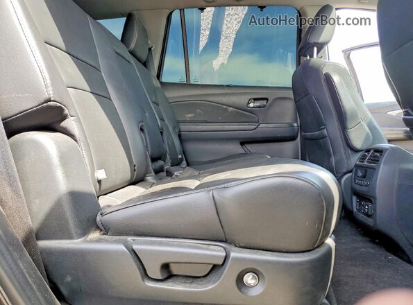 5FNYF6H48KB007567 2019 HONDA PILOT Black Rear interior view