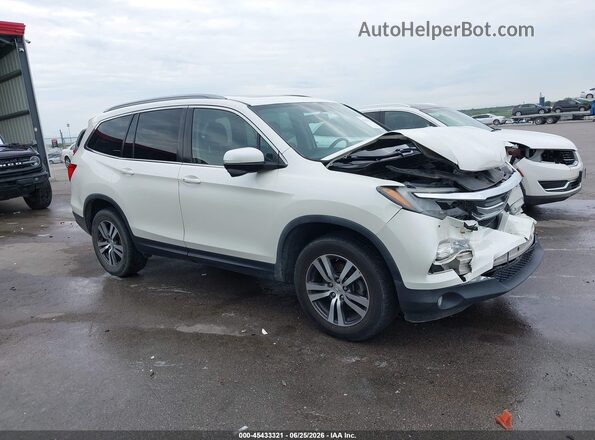 5FNYF6H51JB019003 2018 HONDA PILOT White Սալոնի հետևի տեսք