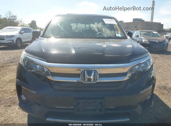 5FNYF6H51KB089313 2019 HONDA PILOT Black Вид задньої частини салону