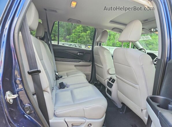 5FNYF6H52HB103485 2017 HONDA PILOT Blue Вид задньої частини салону