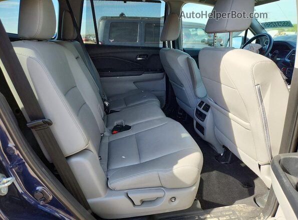 5FNYF6H52KB028617 2019 HONDA PILOT Blue Widok wnętrza z tyłu