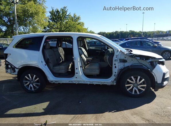5FNYF6H55KB013769 2019 HONDA PILOT White Rear interior view