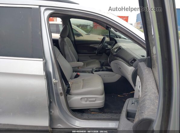 5FNYF6H56LB044935 2020 HONDA PILOT Silver Front interior view