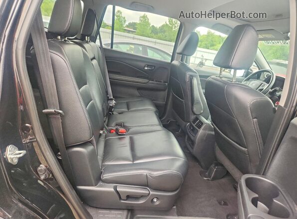 5FNYF6H57HB074873 2017 HONDA PILOT Black Rear seats view