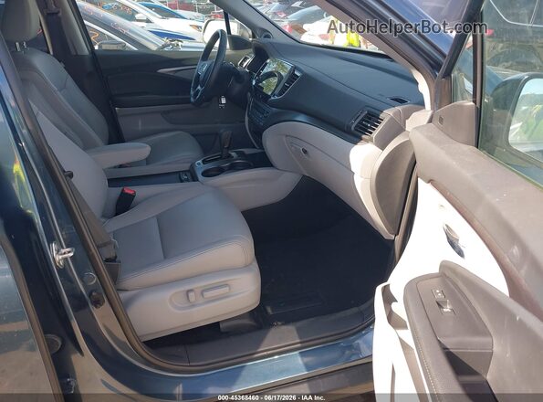 5FNYF6H57KB099733 2019 HONDA PILOT Blue Вид салону спереду