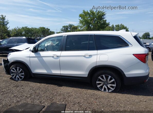 5FNYF6H57LB017484 2020 HONDA PILOT White Вид задньої частини салону