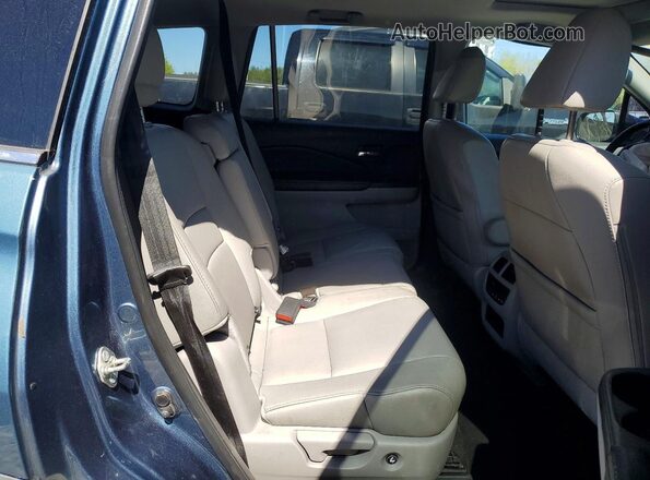 5FNYF6H58HB016805 2017 HONDA PILOT Blue Widok wnętrza z tyłu