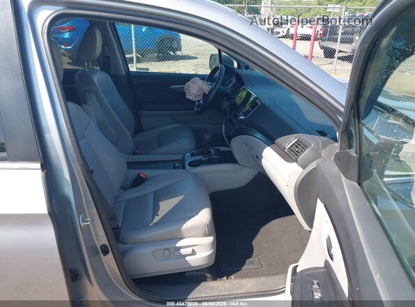 5FNYF6H58KB050654 2019 HONDA PILOT Silver Widok wnętrza z przodu