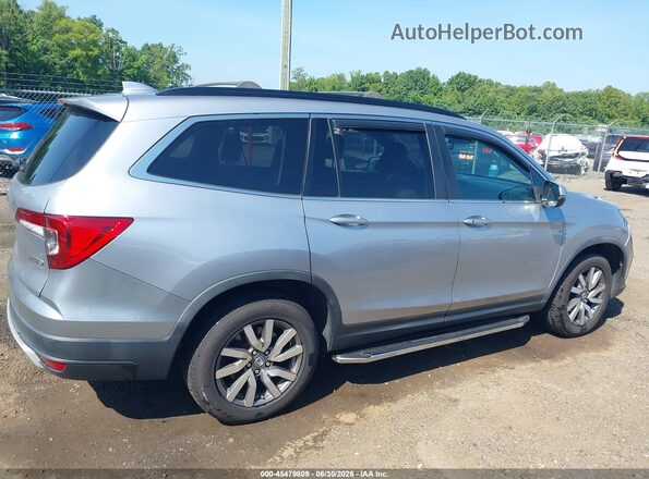 5FNYF6H58KB050654 2019 HONDA PILOT Silver Widok wnętrza z tyłu