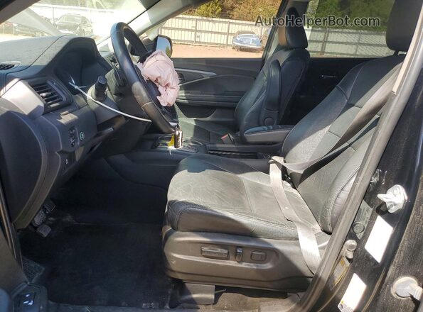5FNYF6H58MB051466 2021 HONDA PILOT Black Front interior view