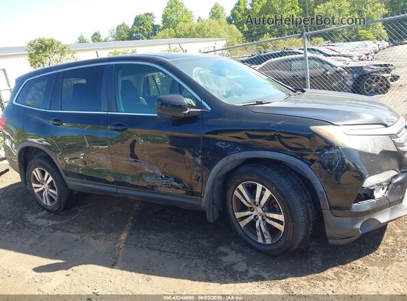 5FNYF6H59HB063633 2017 HONDA PILOT Black Սալոնի հետևի տեսք