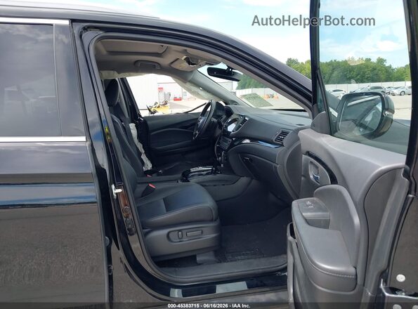 5FNYF6H65MB077886 2021 HONDA PILOT Black Front interior view