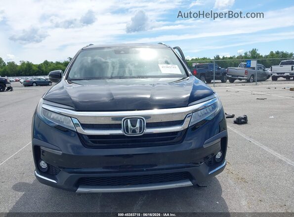 5FNYF6H65MB077886 2021 HONDA PILOT Black Rear interior view