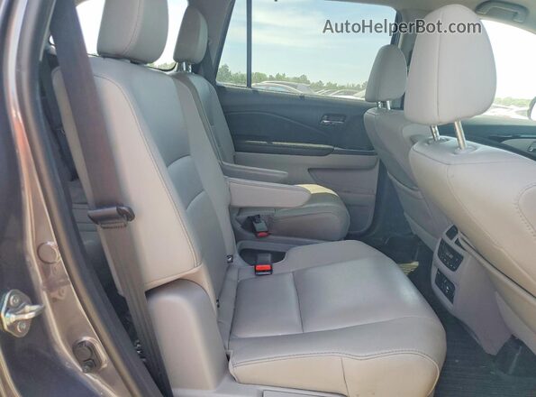 5FNYF6H69KB076494 2019 HONDA PILOT Gray Widok wnętrza z tyłu