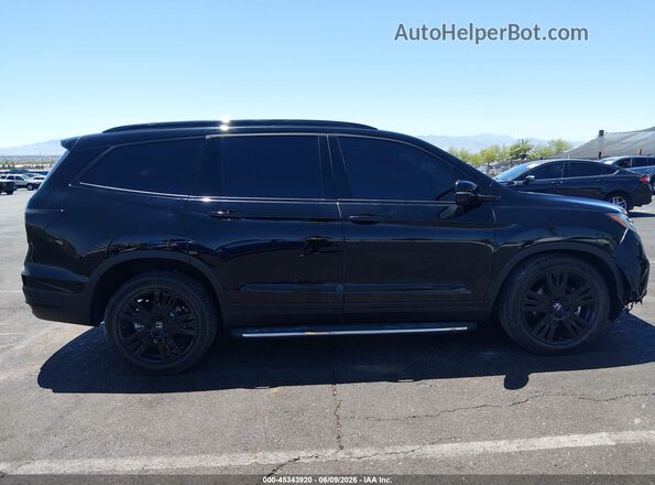 5FNYF6H74MB085597 2021 HONDA PILOT Black Widok wnętrza z tyłu