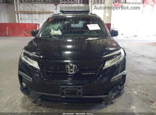 5FNYF6H76NB059780 2022 HONDA PILOT Черный Вид задней части салона