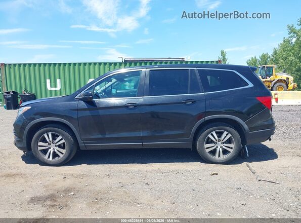 5FNYF6H7XGB092381 2016 HONDA PILOT Черный Вид задней части салона