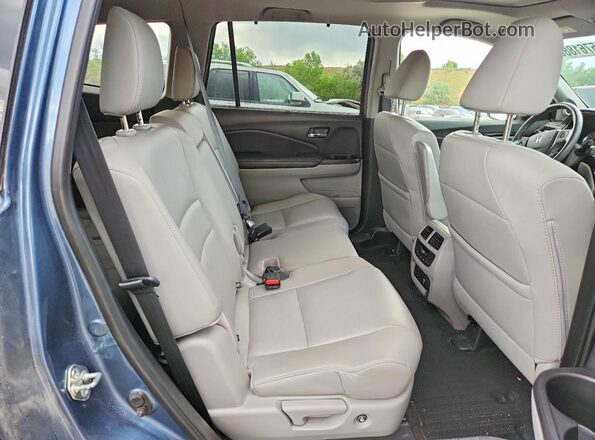 5FNYF6H92HB065887 2017 HONDA PILOT Teal Widok wnętrza z tyłu