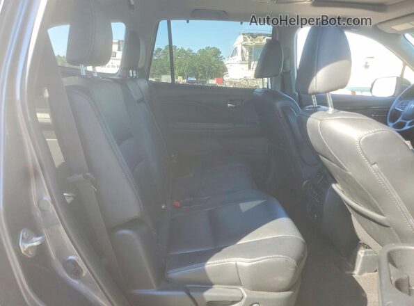 5FNYF6H92KB100483 2019 HONDA PILOT Gray Rear interior view