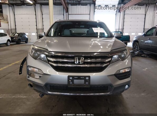 5FNYF6H93HB015726 2017 HONDA PILOT Серебряный Вид задней части салона