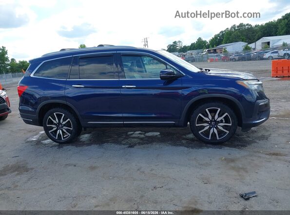 5FNYF6H95KB074395 2019 HONDA PILOT Blue Rear interior view