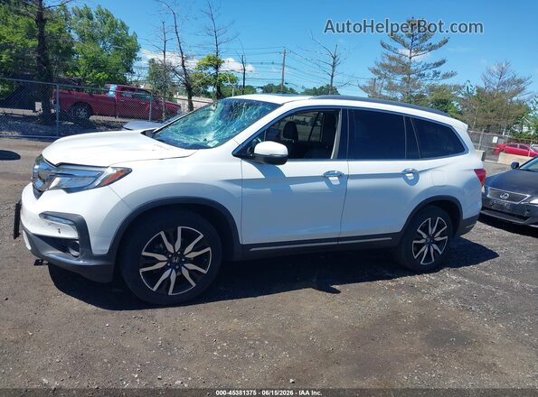 5FNYF6H96MB058533 2021 HONDA PILOT White 360 interior view