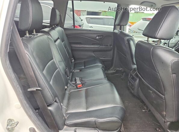 5FNYF6H97HB074780 2017 HONDA PILOT White Rear interior view