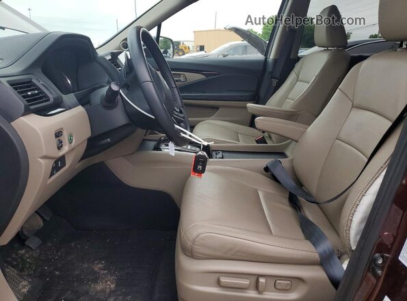 5FNYF6H98MB076760 2021 HONDA PILOT Burgundy Front interior view