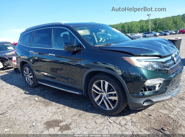 5FNYF6H99HB094867 2017 HONDA PILOT Черный Вид задней части салона