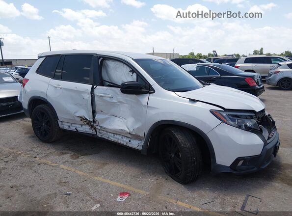 5FNYF7H21MB012875 2021 HONDA PASSPORT White Vista interior trasera