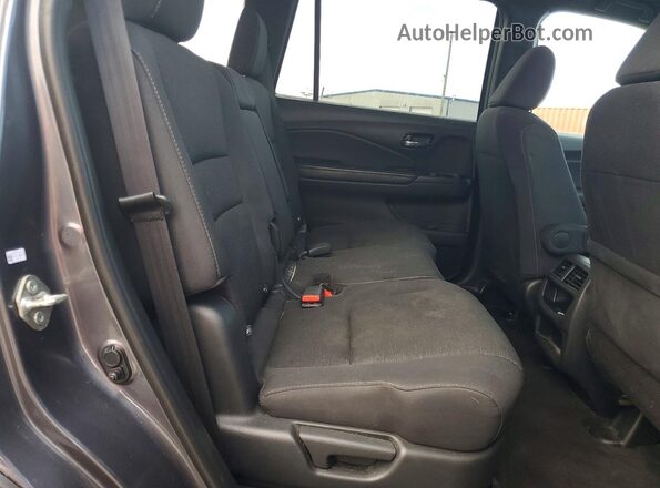 5FNYF7H27KB007077 2019 HONDA PASSPORT Gray Rear interior view