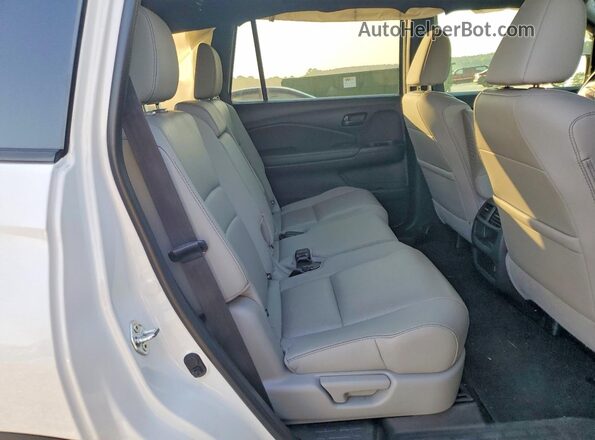 5FNYF7H52NB007194 2022 HONDA PASSPORT White Vista interior trasera
