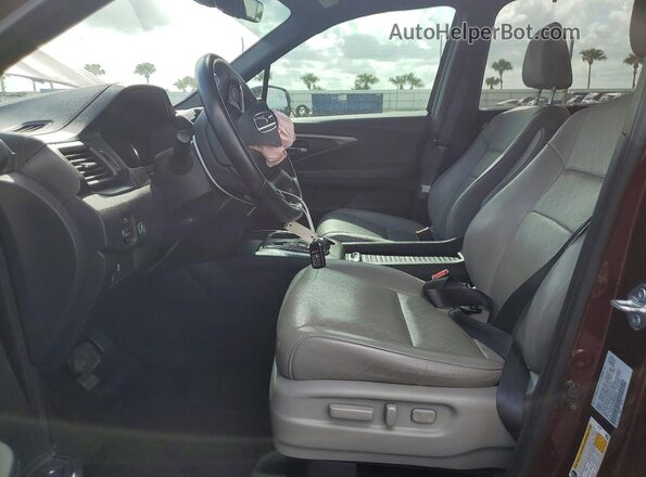 5FNYF7H56MB003325 2021 HONDA PASSPORT Maroon Widok wnętrza z przodu