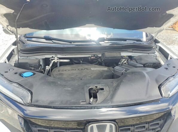 5FNYF7H59LB003317 2020 HONDA PASSPORT White Вид задньої частини салону
