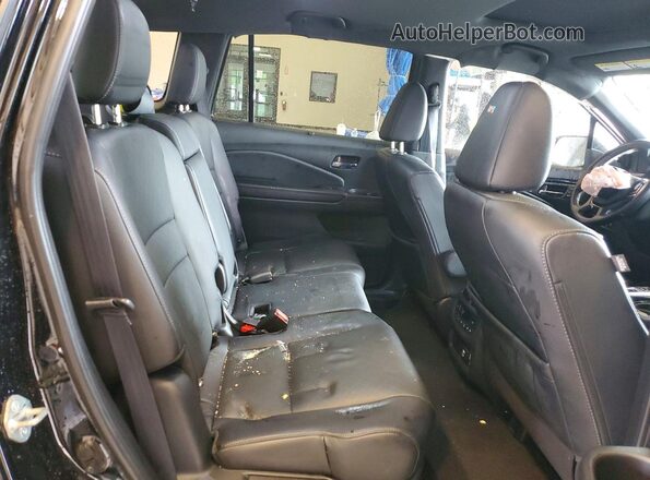 5FNYF7H92LB004991 2020 HONDA PASSPORT Black Vista de los asientos traseros