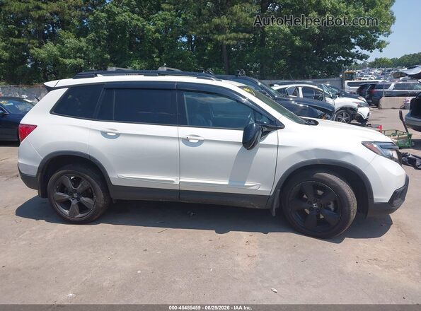 5FNYF8H04KB003511 2019 HONDA PASSPORT White Widok wnętrza z tyłu