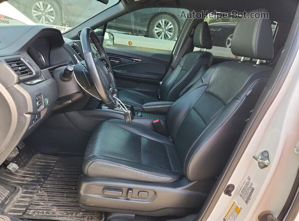 5FNYF8H04LB011190 2020 HONDA PASSPORT White Вид салону спереду