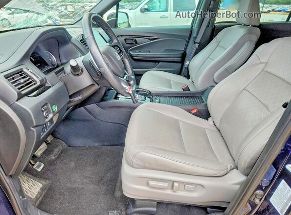 5FNYF8H05PB004691 2023 HONDA PASSPORT Blue Widok wnętrza z przodu