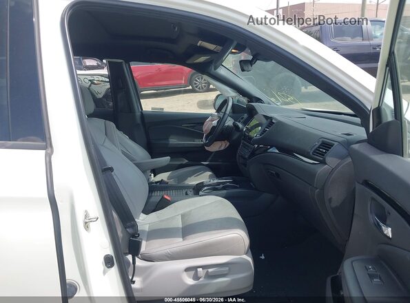 5FNYF8H08KB001521 2019 HONDA PASSPORT White Front interior view