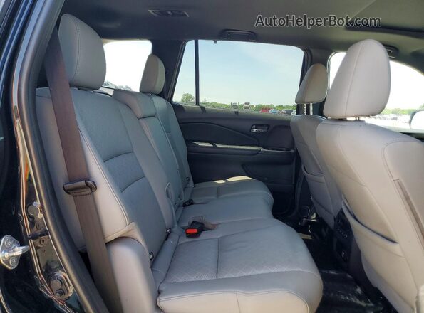 5FNYF8H09KB006436 2019 HONDA PASSPORT Black Rear interior view