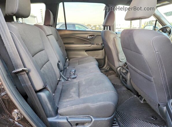 5FNYF8H2XMB020303 2021 HONDA PASSPORT Black Rear interior view