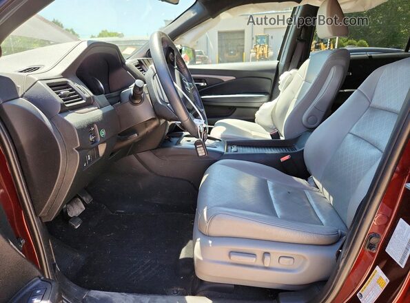 5FNYF8H50MB042613 2021 HONDA PASSPORT Burgundy Front interior view