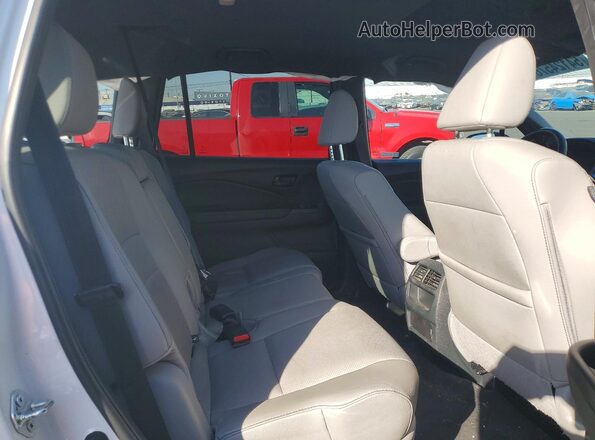 5FNYF8H52PB036798 2023 HONDA PASSPORT White Вид задньої частини салону