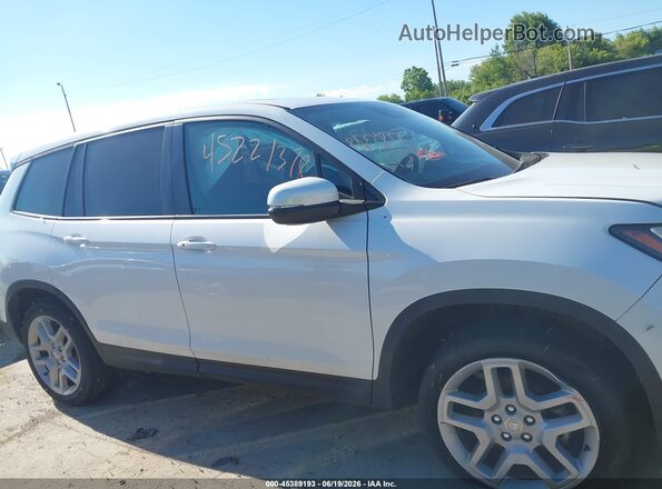 5FNYF8H54RB010075 2024 HONDA PASSPORT White Սալոնի հետևի տեսք