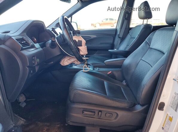 5FNYF8H55MB011048 2021 HONDA PASSPORT White Вид салону спереду